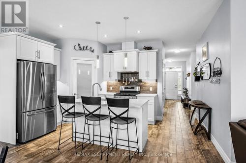 100 Tamarack Boulevard, Woodstock, ON - Indoor Photo Showing Kitchen With Upgraded Kitchen
