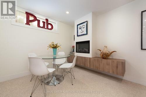 1171 Carson Road, Springwater, ON - Indoor Photo Showing Dining Room With Fireplace