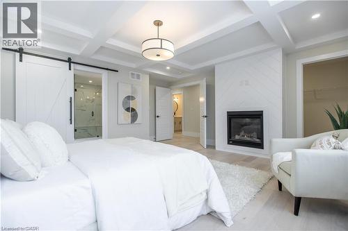 Lot 2 Avery Place, Milverton, ON - Indoor Photo Showing Bedroom With Fireplace