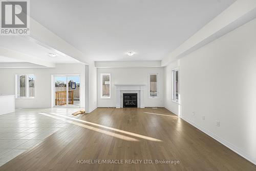 103 Windermere Boulevard, Loyalist, ON - Indoor Photo Showing Living Room With Fireplace