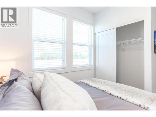 Similar too - 610 Academy Way Unit# 101, Kelowna, BC - Indoor Photo Showing Bedroom