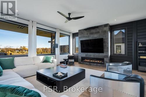4 Raintree Court, Clearview, ON - Indoor Photo Showing Living Room With Fireplace