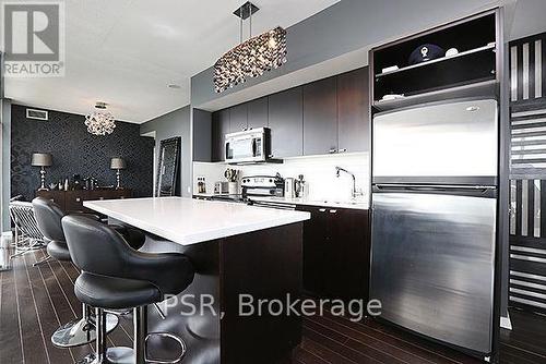 Huge Island/Breakfast Bar - 2104 - 103 The Queens Way, Toronto, ON - Indoor Photo Showing Kitchen