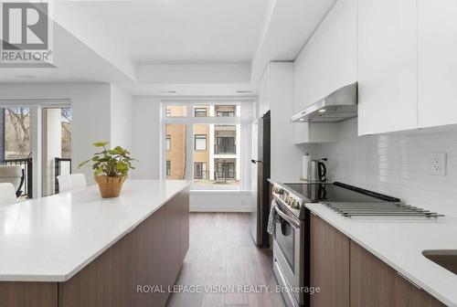 209 - 130 Canon Jackson Drive, Toronto, ON - Indoor Photo Showing Kitchen With Upgraded Kitchen