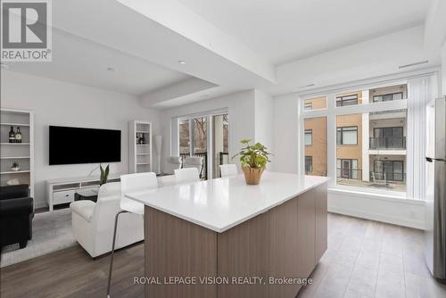209 - 130 Canon Jackson Drive, Toronto, ON - Indoor Photo Showing Living Room