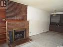 514 3Rd Avenue E, Assiniboia, SK  - Indoor Photo Showing Living Room With Fireplace 