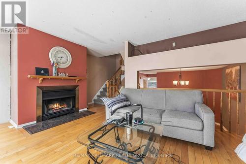 648 Brome Crescent, Ottawa, ON - Indoor Photo Showing Living Room With Fireplace