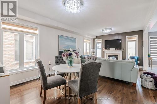 47 Lewis Avenue, Bradford West Gwillimbury, ON - Indoor Photo Showing Dining Room With Fireplace