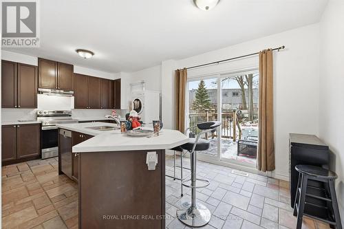 Sliding Door Walkout to the Backyard - 2299 Wiseman Court, Mississauga, ON - Indoor Photo Showing Kitchen With Double Sink
