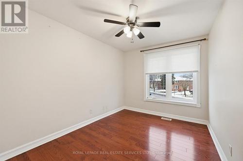 Third Bedroom w/Ceiling Fan and Hardwood Flooring - 2299 Wiseman Court, Mississauga, ON - Indoor Photo Showing Other Room