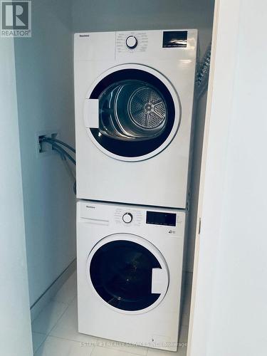 703 - 1195 The Queensway, Toronto, ON - Indoor Photo Showing Laundry Room