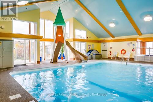 Rec facilities included in monthly condo fee - 465 Mariners Way, Collingwood, ON - Indoor Photo Showing Other Room With In Ground Pool