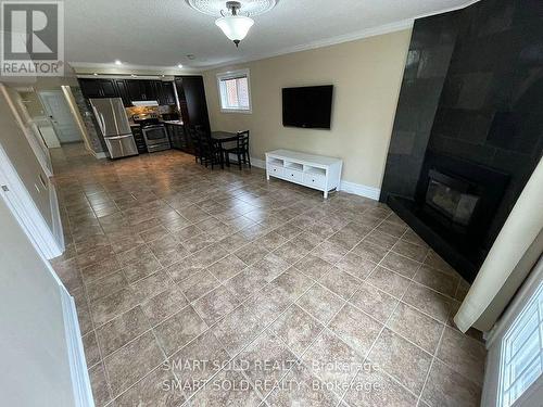 1575 Corkstone Glade, Mississauga, ON - Indoor With Fireplace