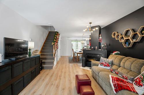 Salon - 158  - 162 Rue Des Peupliers, Blainville, QC - Indoor Photo Showing Living Room With Fireplace