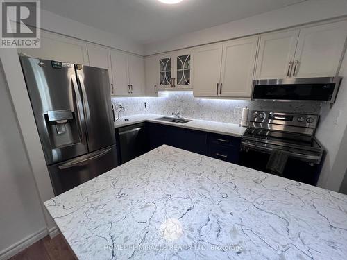 105 - 5 Shady Golfway, Toronto, ON - Indoor Photo Showing Kitchen With Double Sink