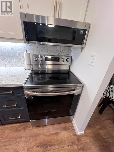 105 - 5 Shady Golfway, Toronto, ON - Indoor Photo Showing Kitchen