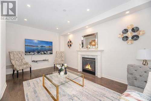52 Blackberry Valley Crescent, Caledon, ON - Indoor Photo Showing Living Room With Fireplace