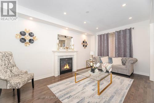 52 Blackberry Valley Crescent, Caledon, ON - Indoor Photo Showing Living Room With Fireplace