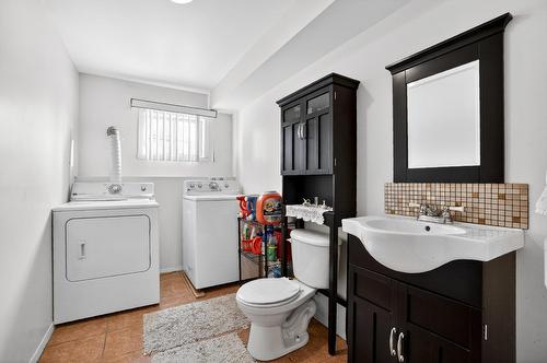 Powder room - 17790 Rue Antoine-Faucon, Montréal (Pierrefonds-Roxboro), QC - Indoor Photo Showing Laundry Room