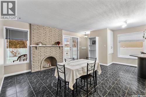 311 Habkirk Drive, Regina, SK - Indoor Photo Showing Other Room With Fireplace