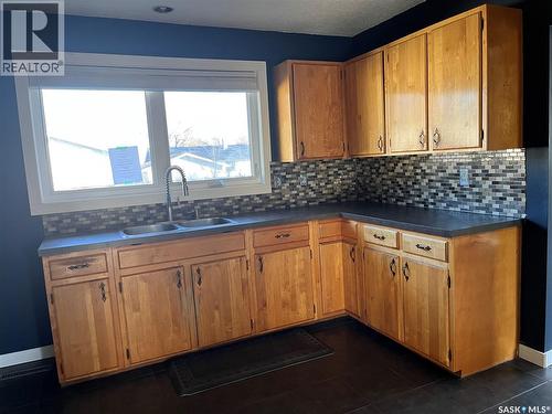 165 Pasqua Street N, Regina, SK - Indoor Photo Showing Kitchen With Double Sink
