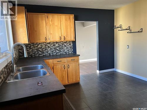 165 Pasqua Street N, Regina, SK - Indoor Photo Showing Kitchen With Double Sink
