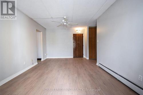 New flooring throughout - 212 - 6 Westlake Lane, St. Catharines (Lakeport), ON - Indoor Photo Showing Other Room