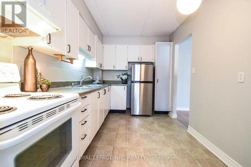 212 - 6 Westlake Lane, St. Catharines (Lakeport), ON - Indoor Photo Showing Kitchen With Double Sink