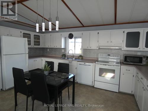 121 - 3033 Townline Road, Fort Erie (Black Creek), ON - Indoor Photo Showing Kitchen With Double Sink
