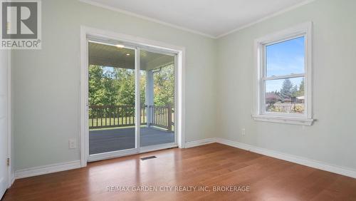 Third bedroom with walkout to deck - 611 Clare Avenue, Welland (N. Welland), ON - Indoor Photo Showing Other Room