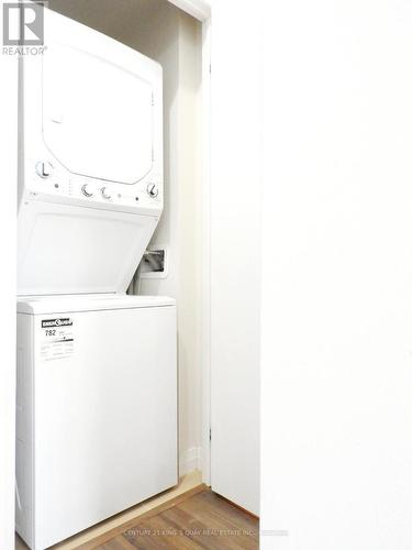 909 - 2150 Lawrence Avenue E, Toronto, ON - Indoor Photo Showing Laundry Room