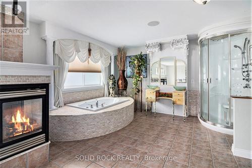 Ensuite Bathroom - 2121 Valin Street, Ottawa, ON - Indoor Photo Showing Bathroom With Fireplace