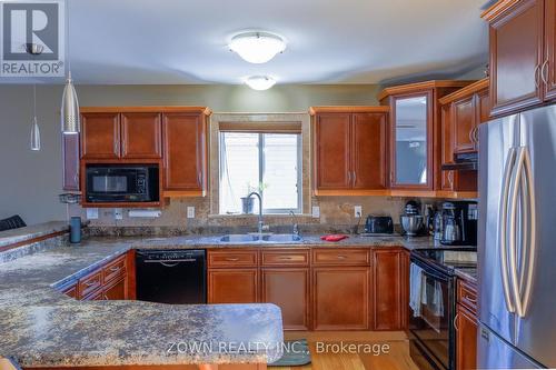 1433 Girard Drive, Lakeshore, ON - Indoor Photo Showing Kitchen With Double Sink