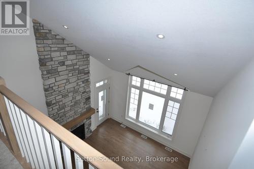 Loft looking down to main floor - 306 Sandpiper Lane, Georgian Bluffs, ON - Indoor Photo Showing Other Room