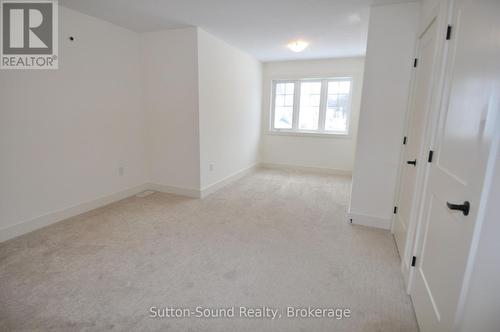 Upstairs Master Suite - 306 Sandpiper Lane, Georgian Bluffs, ON - Indoor Photo Showing Other Room
