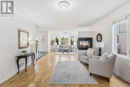 1353 South Wenige Drive, London North (North C), ON - Indoor Photo Showing Living Room With Fireplace