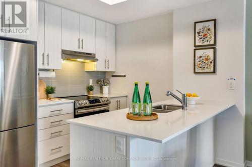 98 - 20 William Jackson Way, Toronto, ON - Indoor Photo Showing Kitchen With Double Sink With Upgraded Kitchen