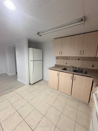Bsmt-29 Penzance Drive, Toronto, ON - Indoor Photo Showing Kitchen With Double Sink