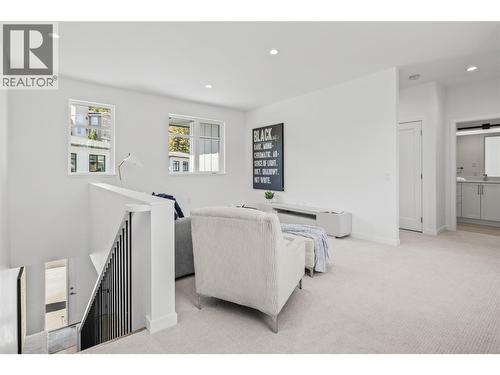 Flex space - Photo of a similar home in the community. - 1979 Country Club Drive Unit# 7, Kelowna, BC - Indoor Photo Showing Other Room