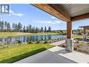 Patio - Photo of a similar home in the community. - 1979 Country Club Drive Unit# 7, Kelowna, BC  - Outdoor With Body Of Water With View 