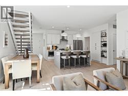 Living Room - Photo of a similar home in the community. - 