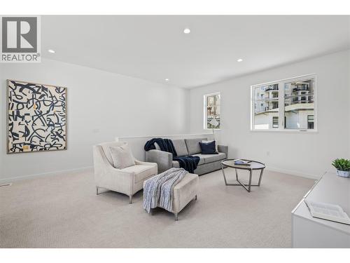 Flex space - Photo of a similar home in the community. - 1979 Country Club Drive Unit# 7, Kelowna, BC - Indoor