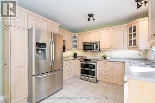 24 Parr Boulevard, Springwater, ON - Indoor Photo Showing Kitchen With Double Sink