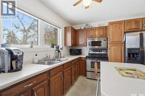 227 Sylvian Way, Saskatoon, SK - Indoor Photo Showing Kitchen With Double Sink