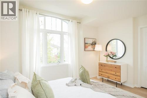 upgraded flooring - 3355 Thomas Street Unit# 10, Mississauga, ON - Indoor Photo Showing Bedroom