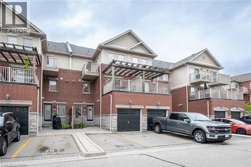 private garage & driveway - 3355 Thomas Street Unit# 10, Mississauga, ON - Outdoor With Balcony With Facade