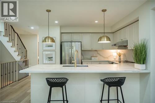 functional & beautiful - 3355 Thomas Street Unit# 10, Mississauga, ON - Indoor Photo Showing Kitchen With Upgraded Kitchen