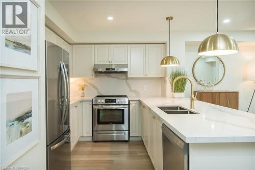 high-end upgraded kitchen - 3355 Thomas Street Unit# 10, Mississauga, ON - Indoor Photo Showing Kitchen With Double Sink With Upgraded Kitchen