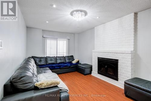 123 Flowertown Avenue, Brampton, ON - Indoor Photo Showing Living Room With Fireplace