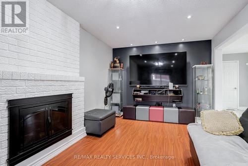 123 Flowertown Avenue, Brampton, ON - Indoor Photo Showing Living Room With Fireplace